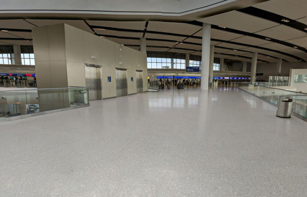 Gray poured in place epoxy terrazzo floor at NOLA airport